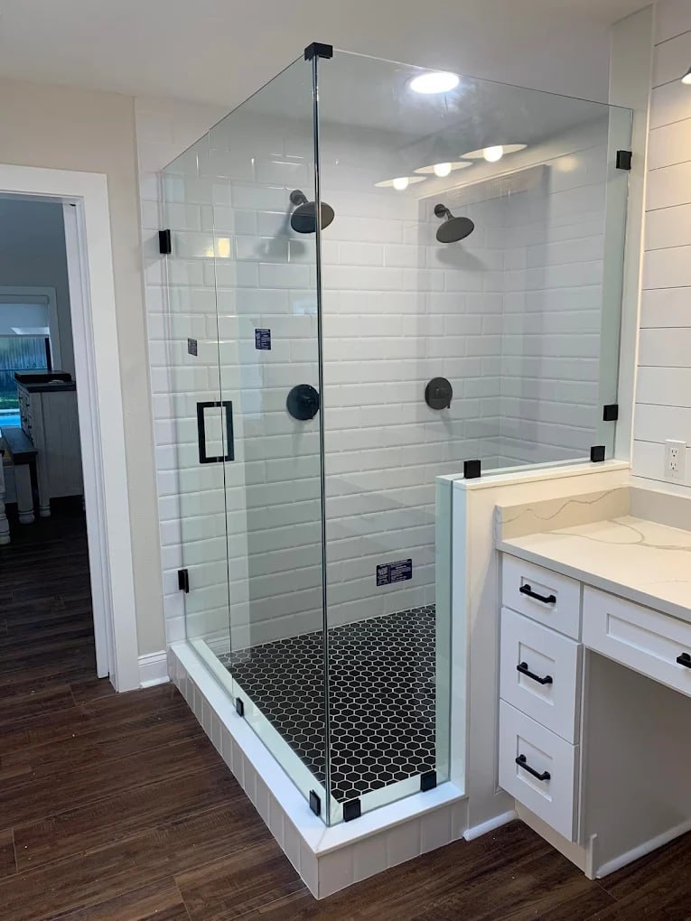 Matte black hardware with white subway tile
